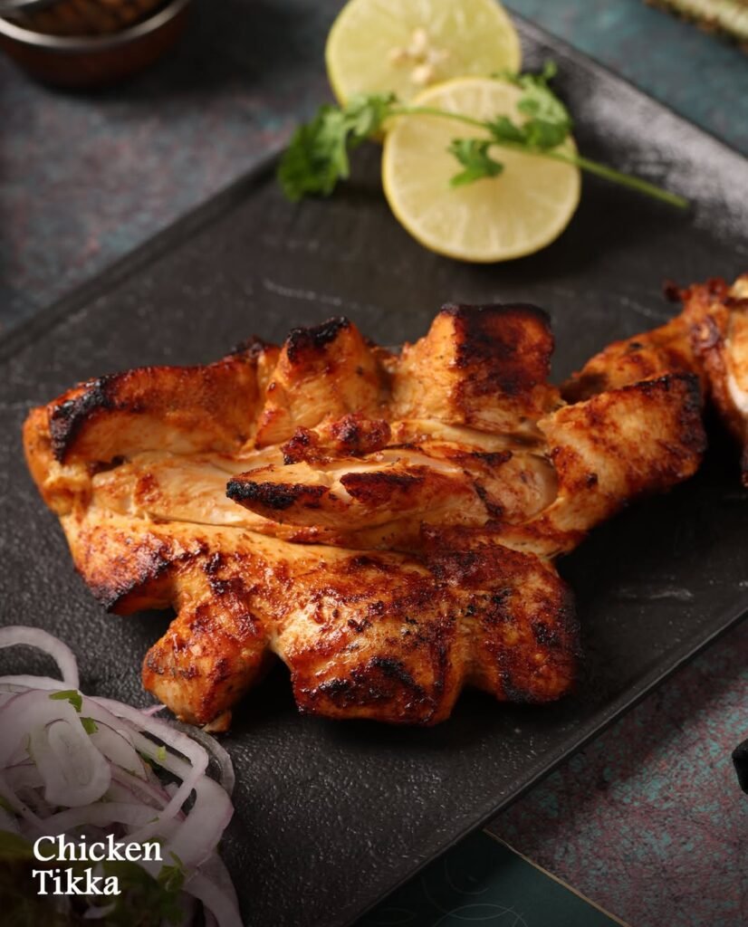 PCOS-friendly meal prep featuring salmon, eggs, avocado, and leafy greens, part of a sugar-free and dairy-free anti-inflammatory diet."