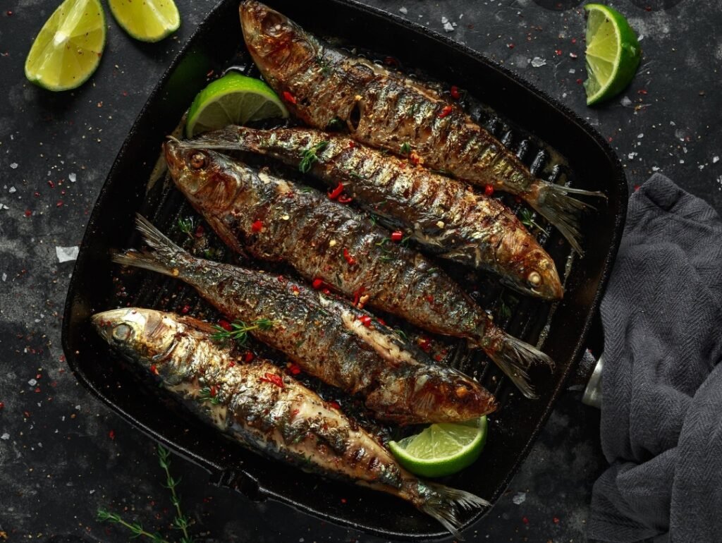 High-protein, keto-friendly grilled fish platter with lime, perfect for a low-carb diet