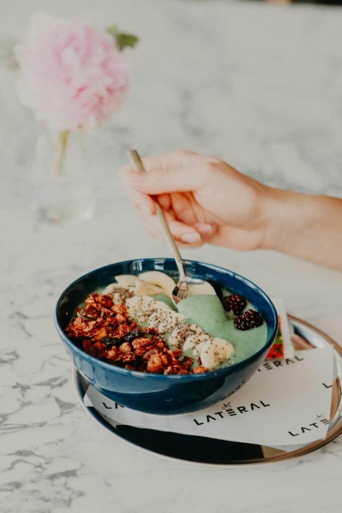 Prioritise Protein and Fibre: Eating lean protein (chicken, tofu, beans) and high-fibre foods (vegetables, whole grains) at every meal helps stabilise blood sugar and keeps you full longer.